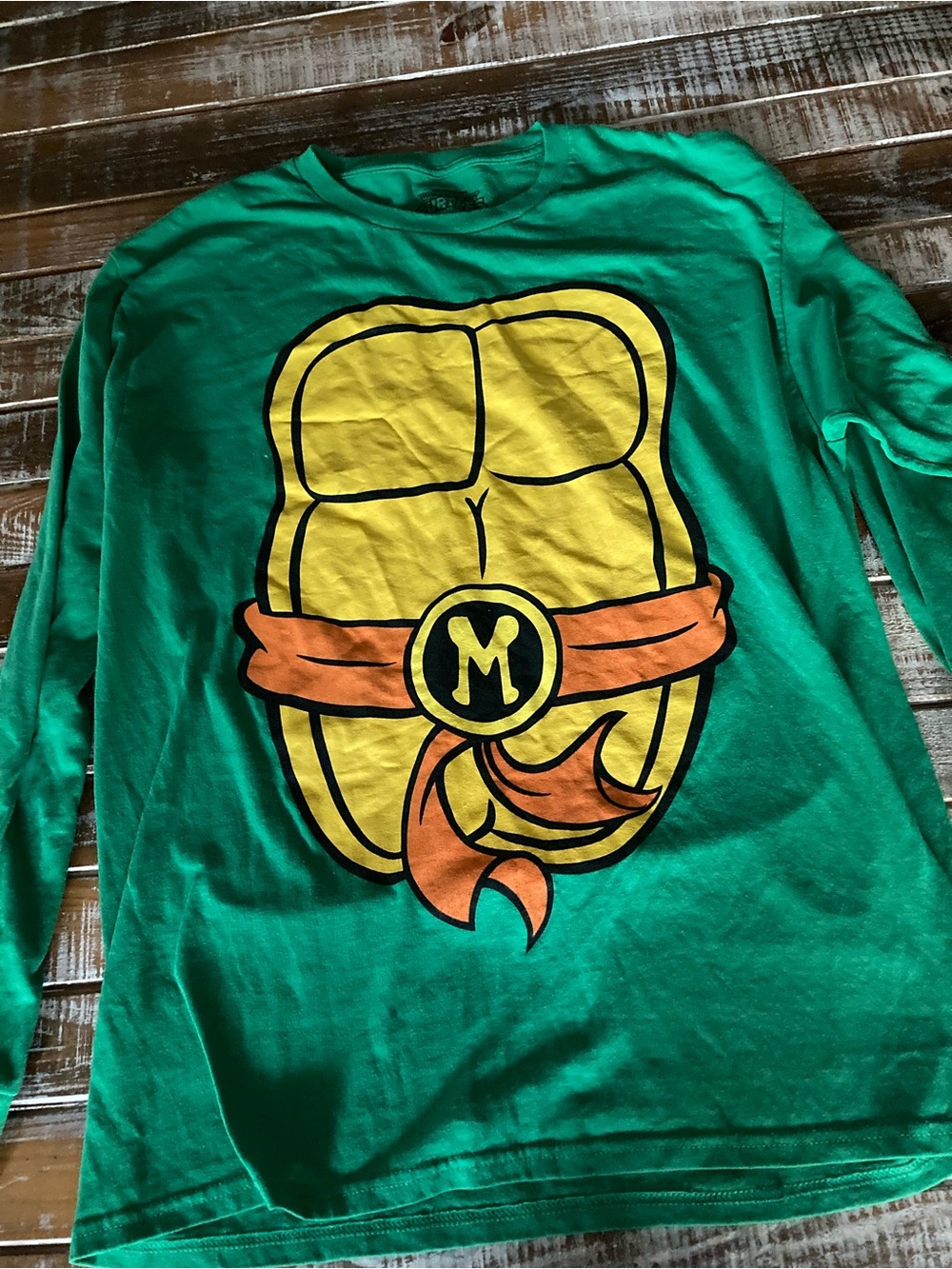 Green Graphic Long-Sleeve Tee with Yellow Shell Design